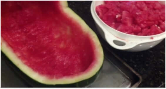 Cut-or-scoop-the-watermelon-out
